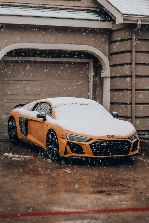 Sports car covered in snow