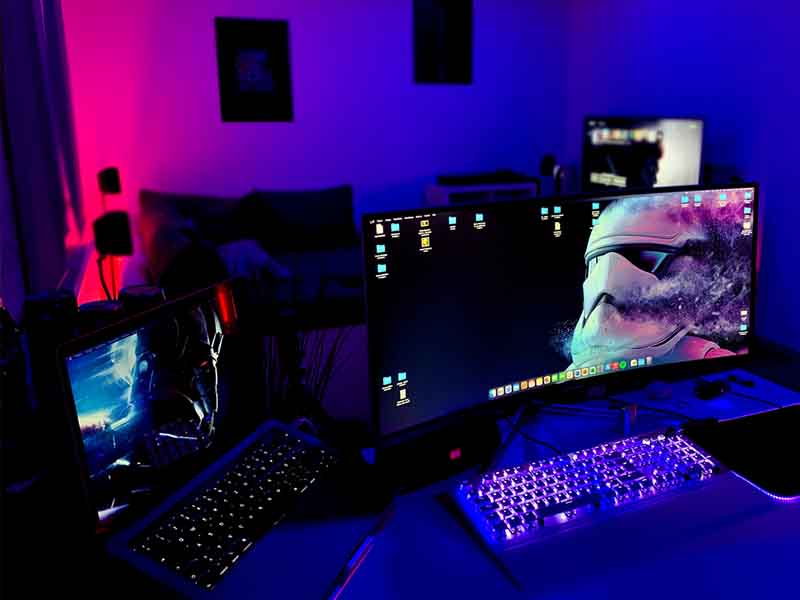 Gaming monitors in dark room