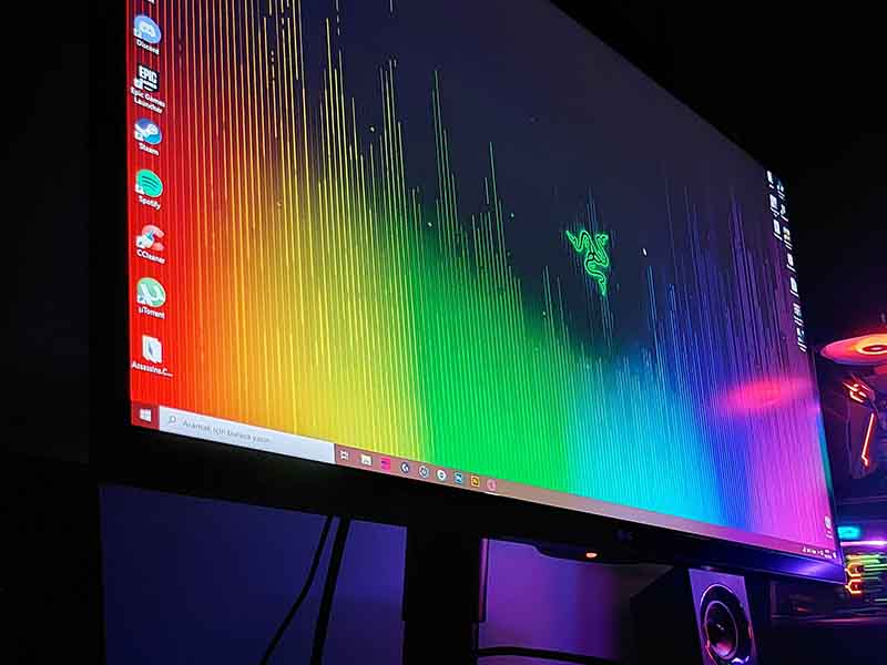 PC monitor with rainbow lights and other gaming implements