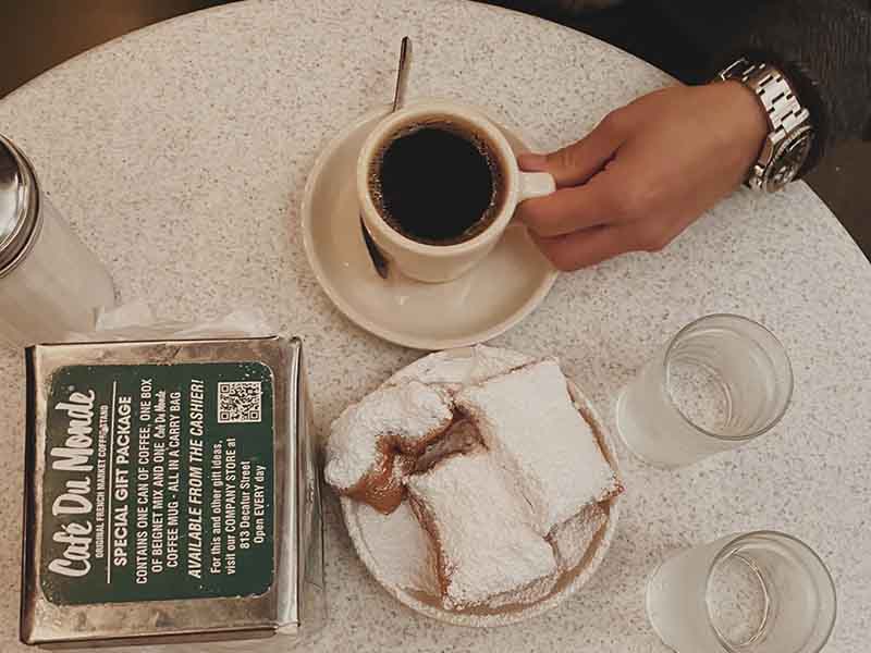 Coffee and beignets at Cafe Du Monde in New Orleans