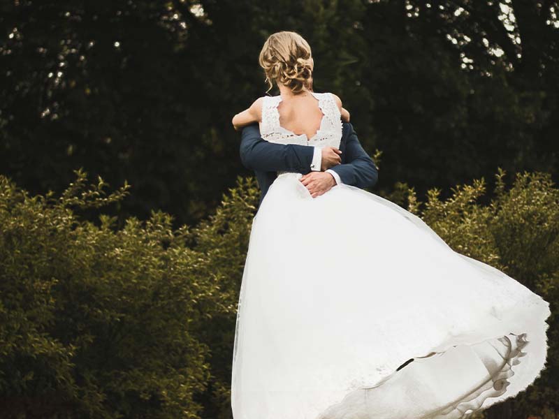 Bride and Groom hugging
