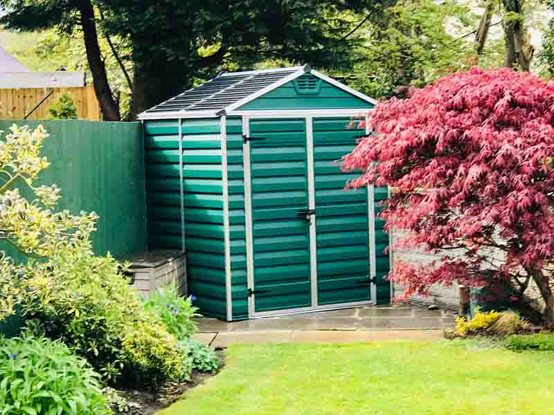 Green garden shed