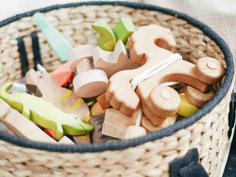 Child's toy basket filled with toys