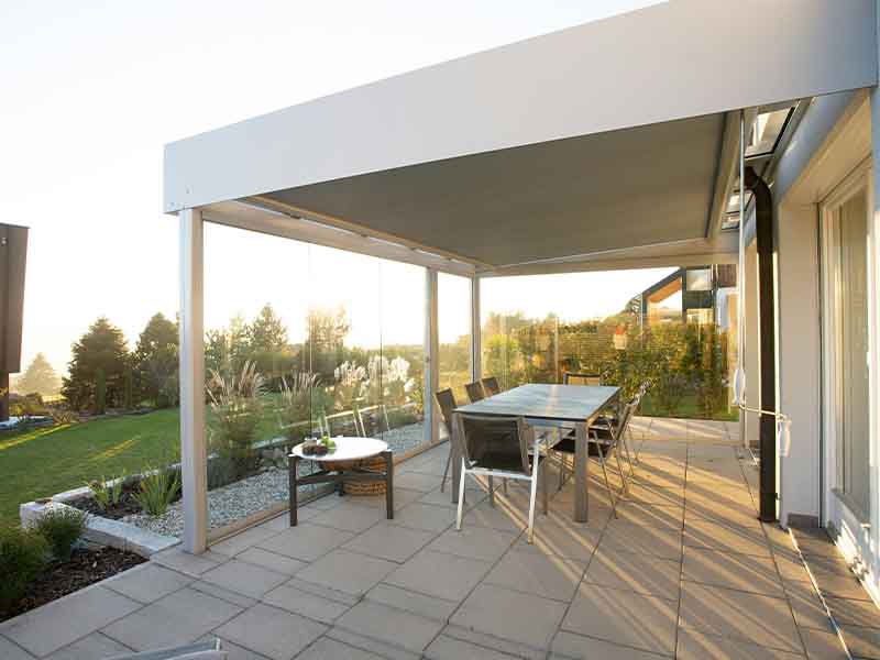 Covered porch with retractable awning