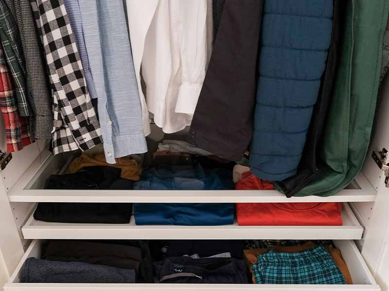 Clothing hanging in closet