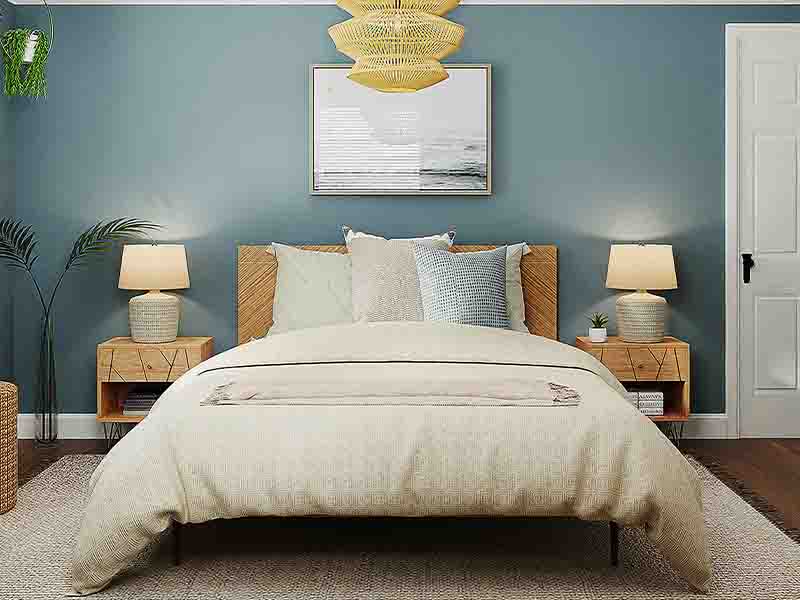Serene bedroom with blue walls and neutral accents