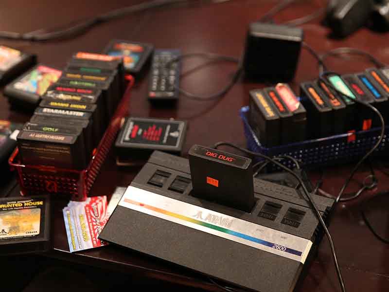 Old Atari game unit with game cartridges