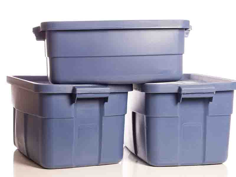 Blue storage bins stacked on each other