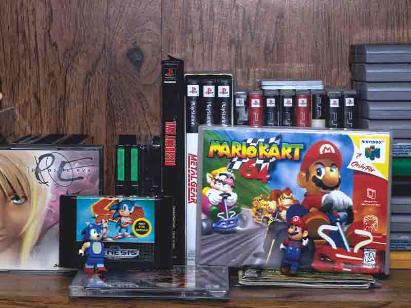 Video games propped up on shelf