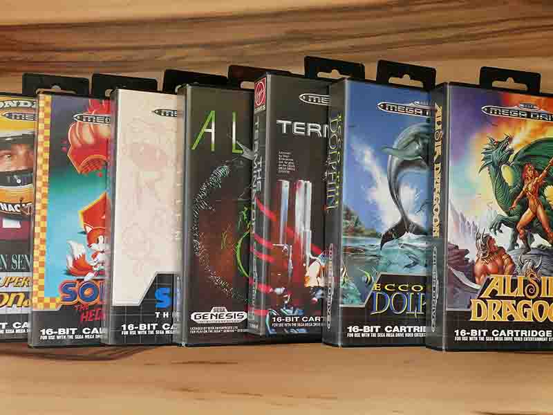 Row of video games sitting on a shelf
