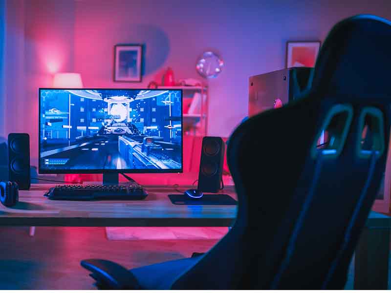 Game room with blue and pink ambient light