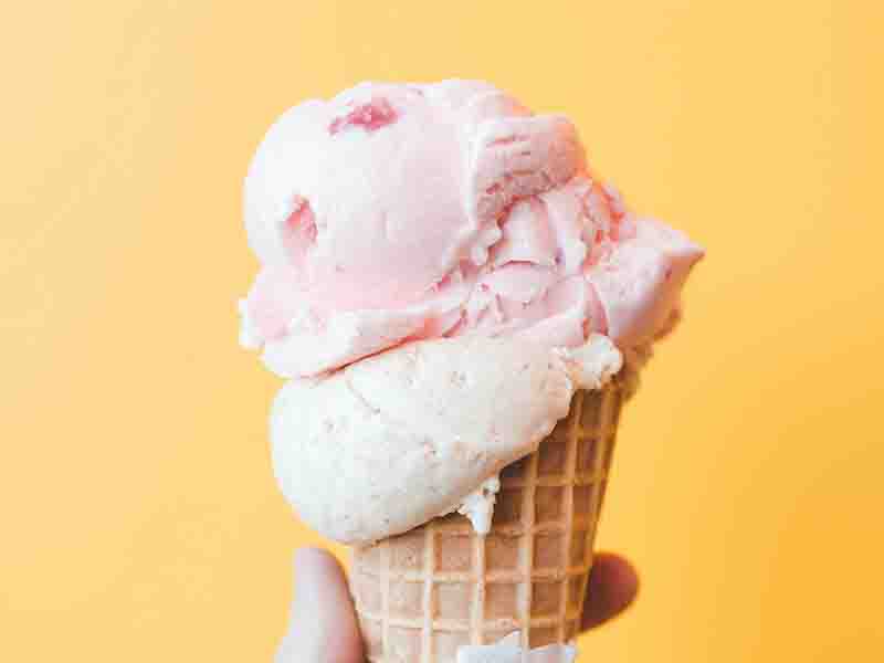 Someone holding an ice cream cone