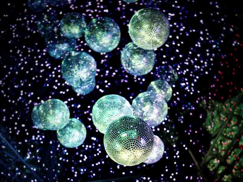 Mirrored disco balls hanging from ceiling