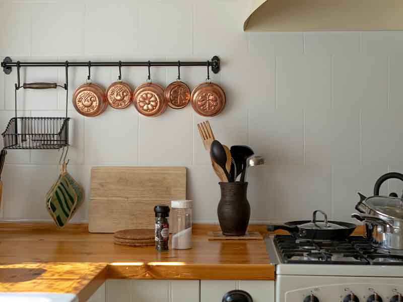 Vintage kitchen with copper pot display