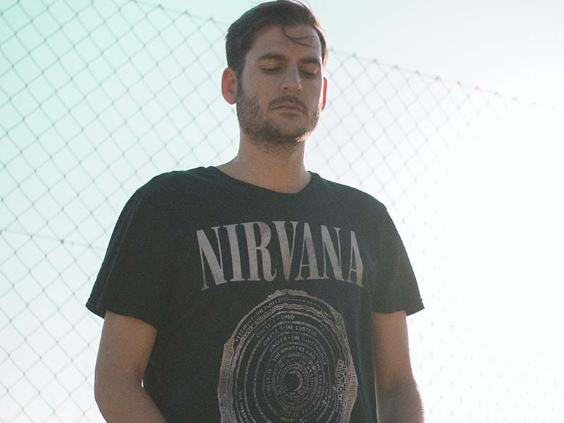 Young man wearing Nirvana band tshirt